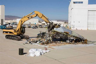 Illustration for article titled F-117 Stealth Fighter + Caterpillar Crusher = Pile of Sadness